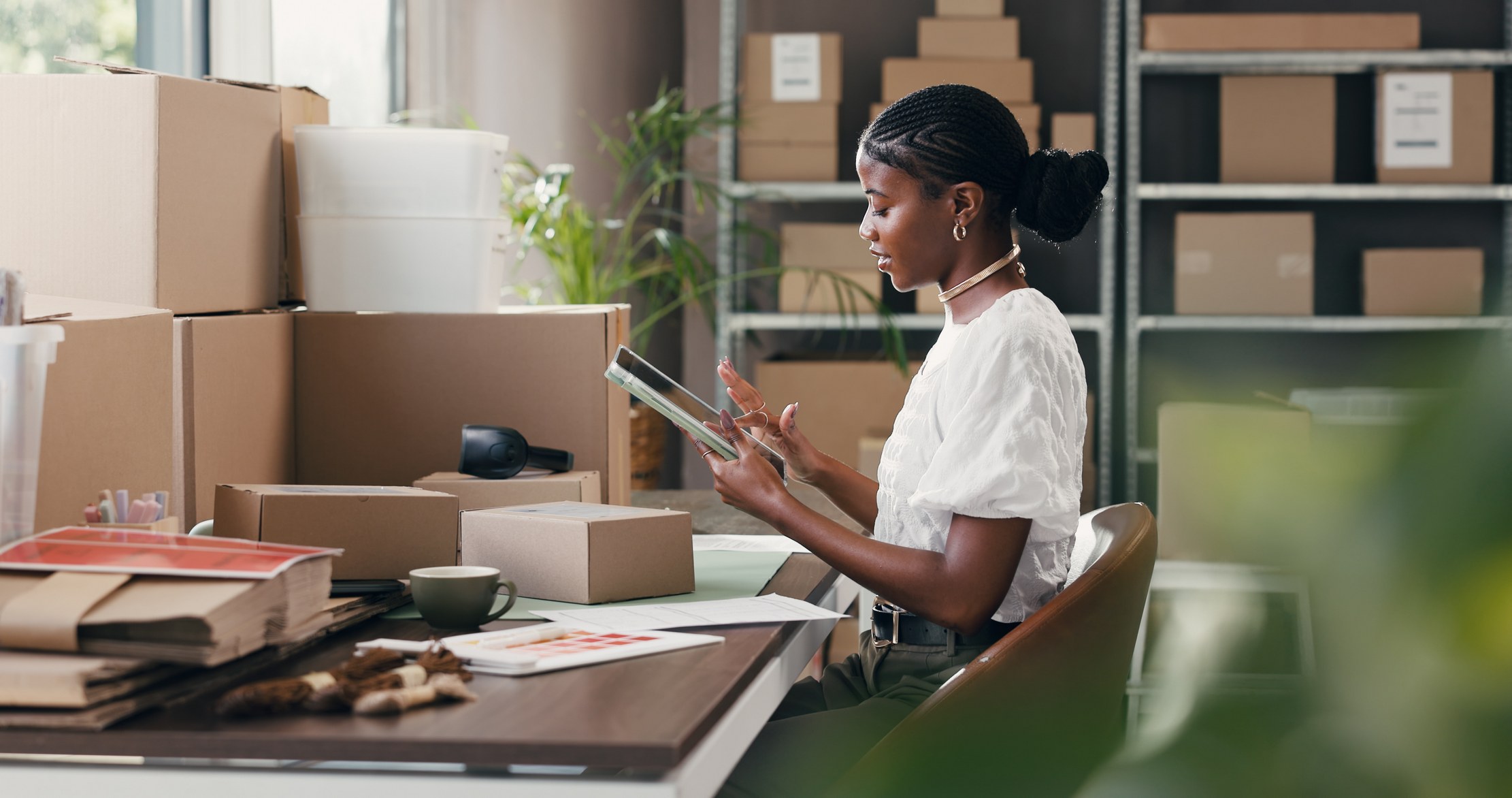 An operations team using a tablet to review inventory movement and branch activity.